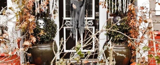 front porch with many Halloween decorations