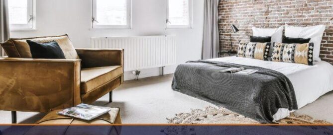 beautiful bedroom with brick feature wall